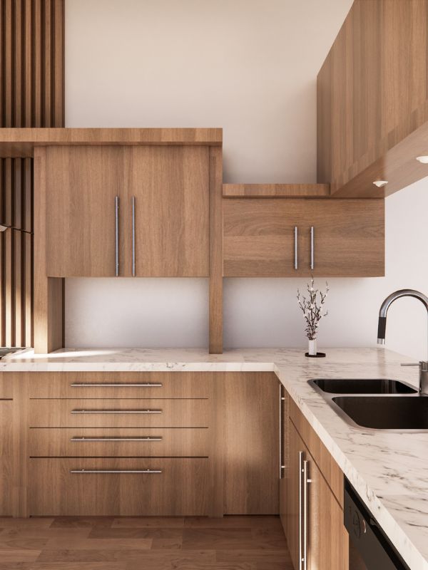 Empty kitchen with brown wooden cabinets, representing a move out clean